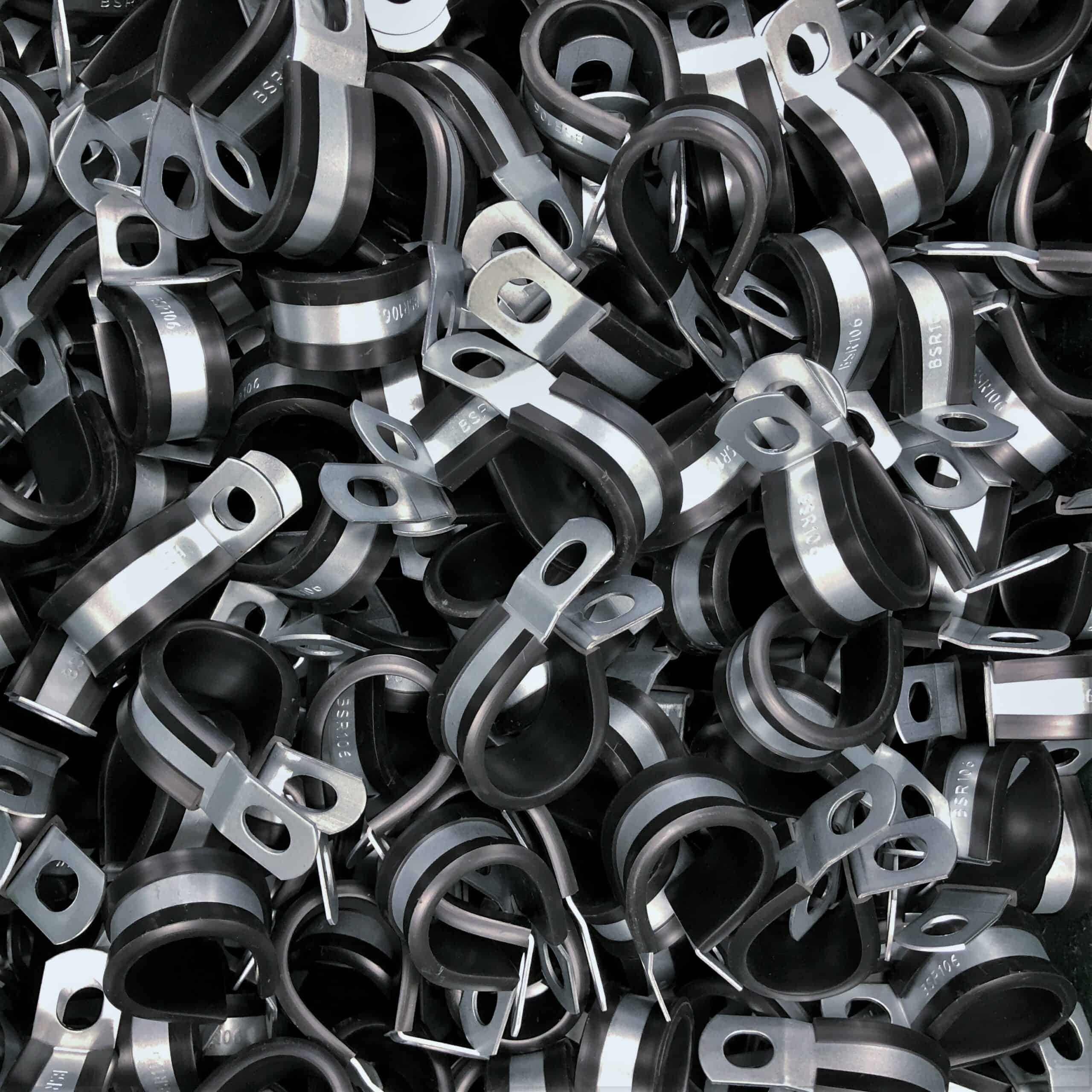 Bundle of rubber-lined P-clips manufactured by Birmingham Specialities Ltd in the UK